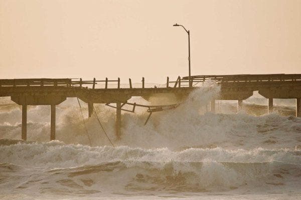 California woman fled the flames for Long Beach only to watch the ocean reach her front door