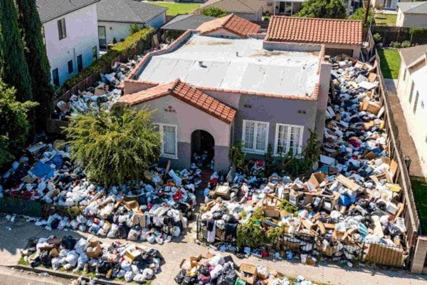 Los Angeles cleaned up mountains of garbage from one home but the story took another messy turn