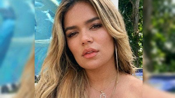 Karol G’s extravagant tour outfits ruffle feathers as PETA Latino questions her fashion choices